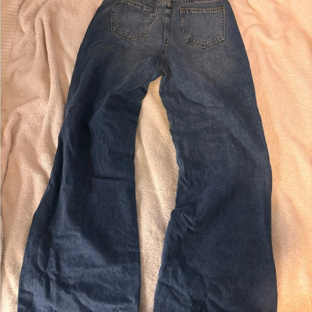 Distressed Blue Jeans - Picture 2 of 2